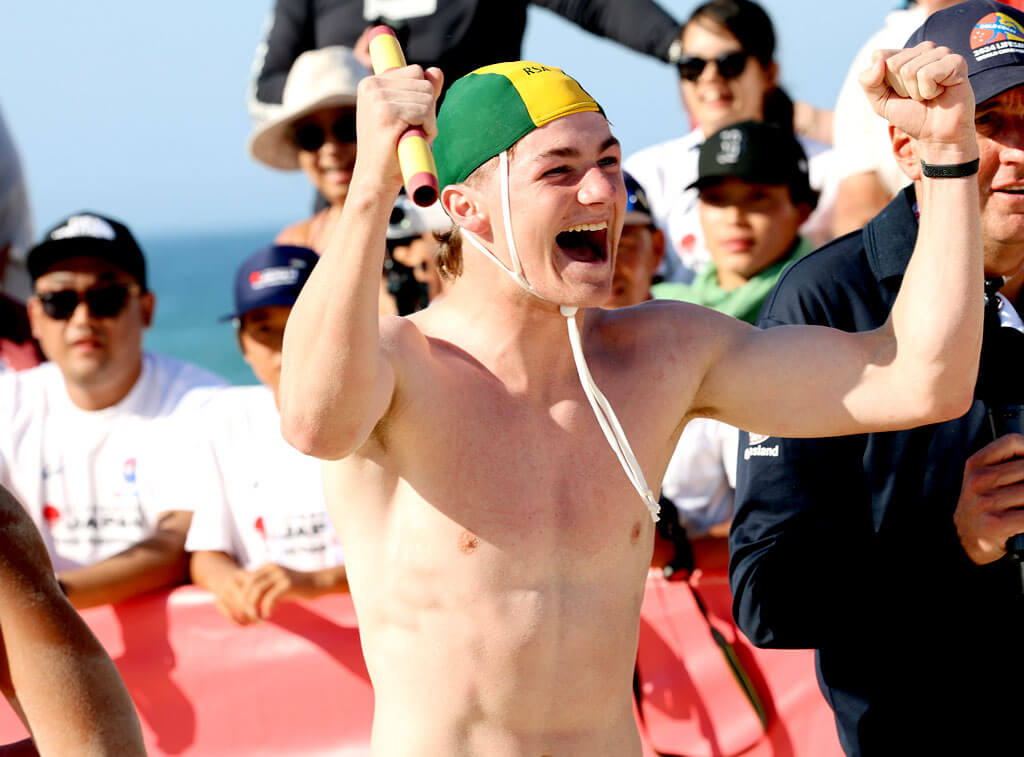 Jake Hutton celebrating a beach flags victory