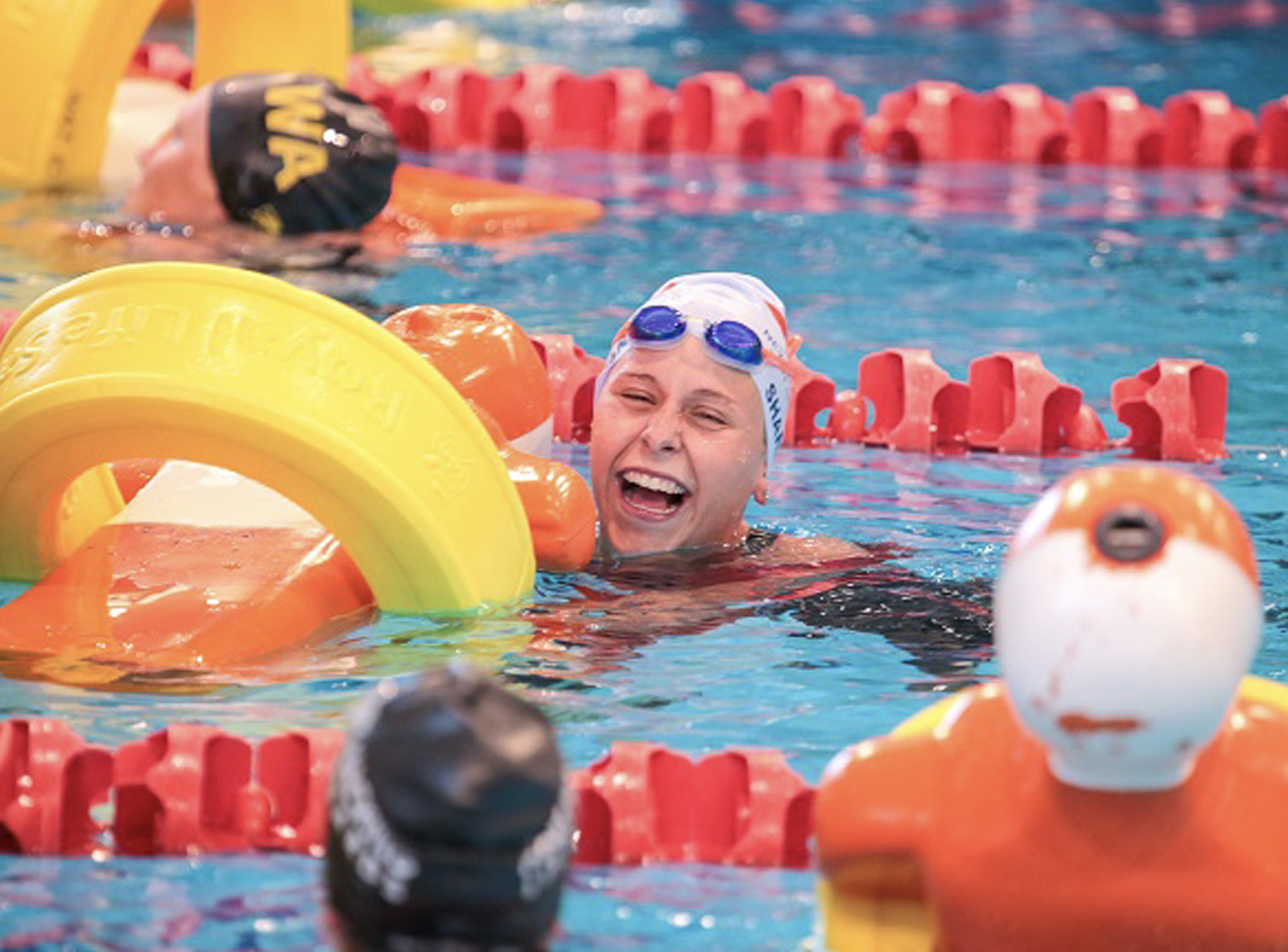 Athlete competing in a pool lifesaving event